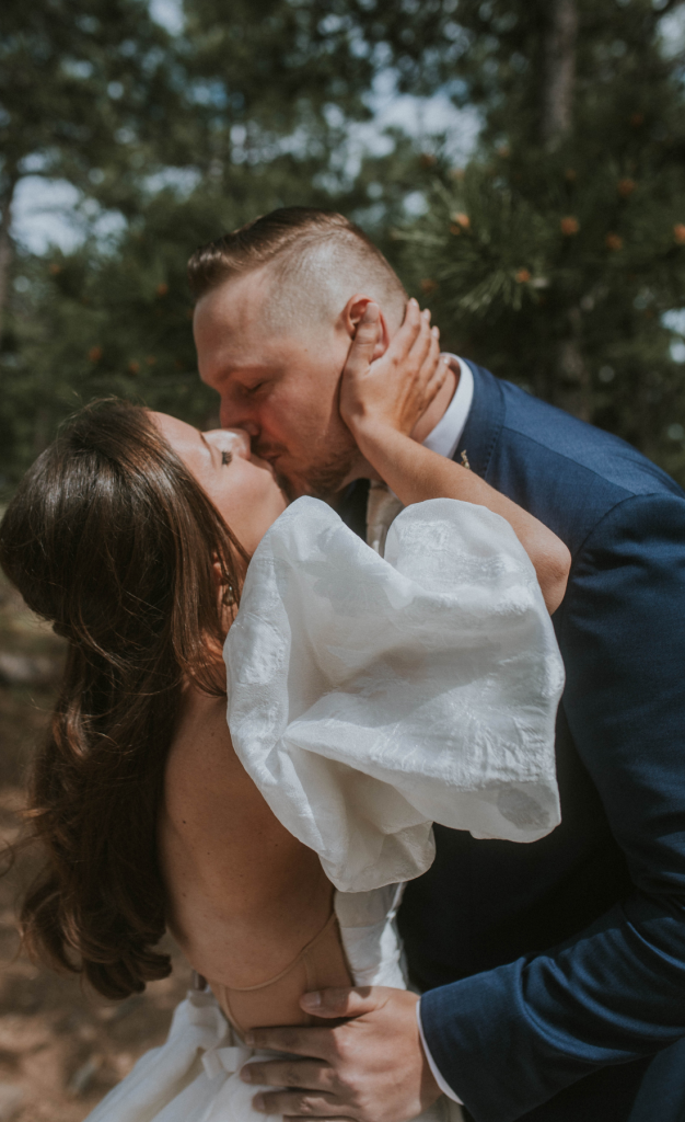 Bride and groom kissing