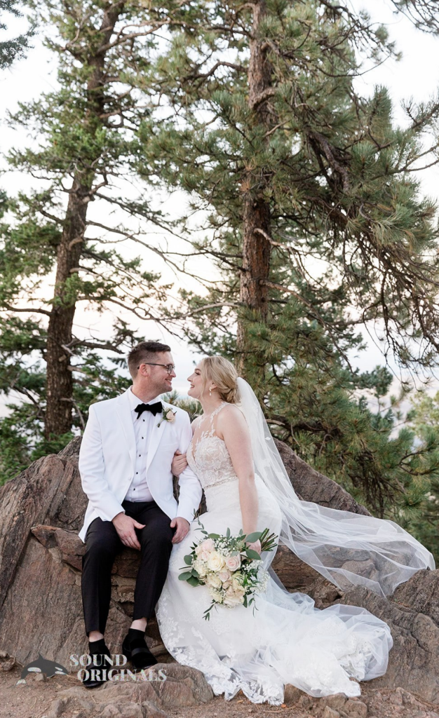 Bride and groom in woods